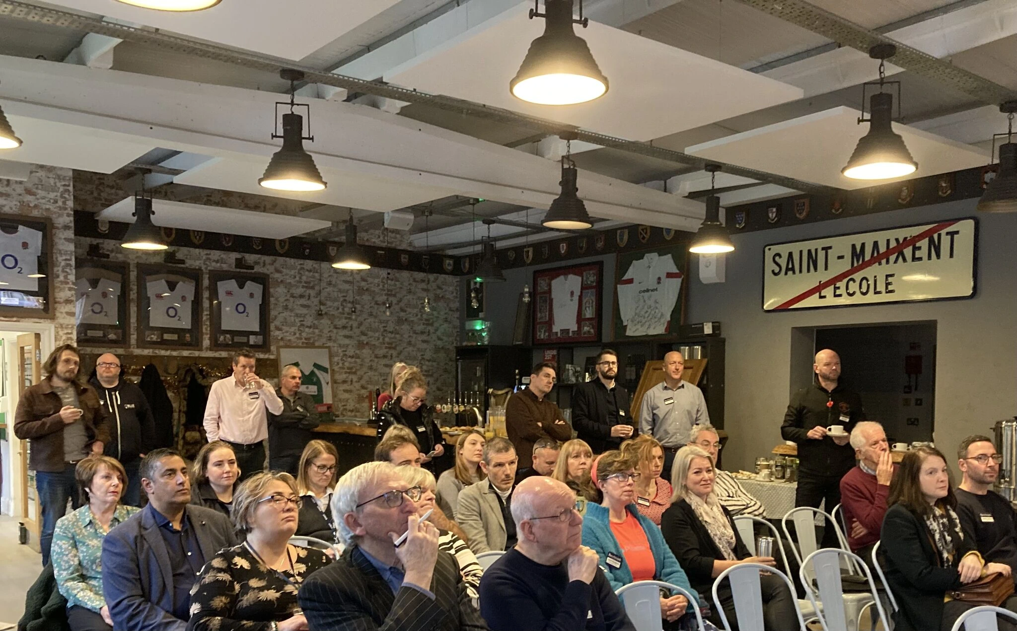 The members of Horsham Rugby Business Group watching Lewis Harman from Harmanised